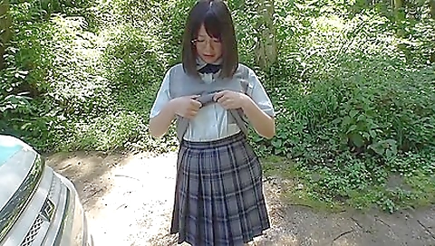 A big-breasted japanese milf with a baby face shows her big booty