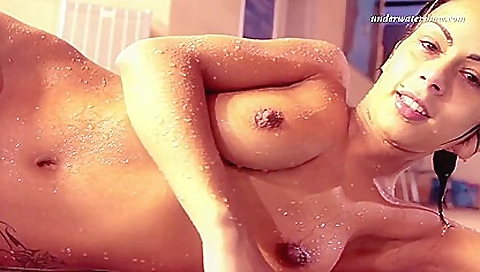 Zlata babe in a sexy bathing suit and stockings in the pool