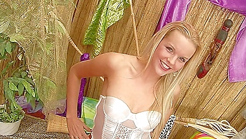 Sexy blonde in lingerie gets on her knees to make love