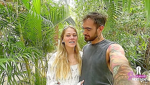 Blonde with a nice ass gets a deepthroating shot in the jungle