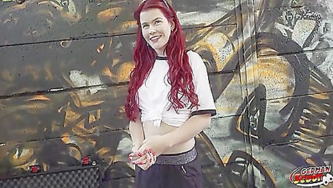 Horny redhead plays football for public anal fucking