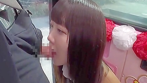 Japanese girl with a sexy face is getting on her knees