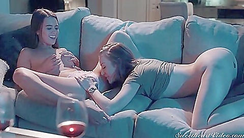 Brunette lesbian and her lesbian friend fucking and kissing