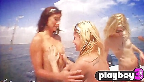 Blonde and brunette in a group sex with a guy in the boat