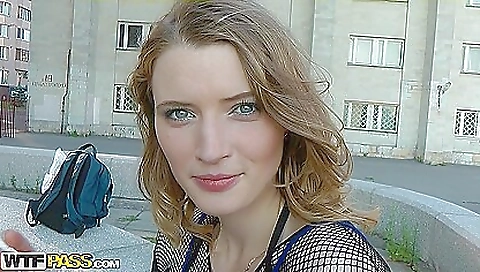 Busty brunette babe in sexy stockings in the streets