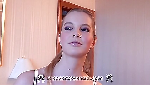 Blonde shemale in black lingerie gets fucked in a threesome