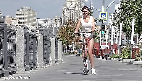 Hot brunette in a black skirt and shorts in public