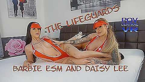 Busty brunette and two other girls are fucking on the couch