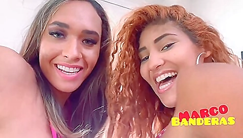 Tattooed redhead and brunette deepthroat threesome