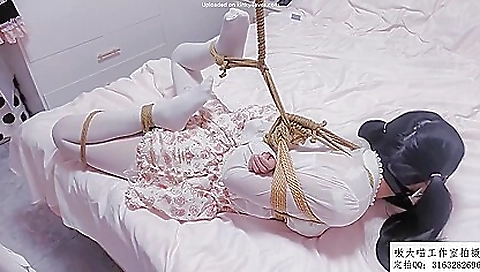 Busty brunette with a shaved pussy and natural tits