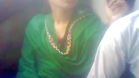 Asian brunette enjoys riding a bus in her long black dress